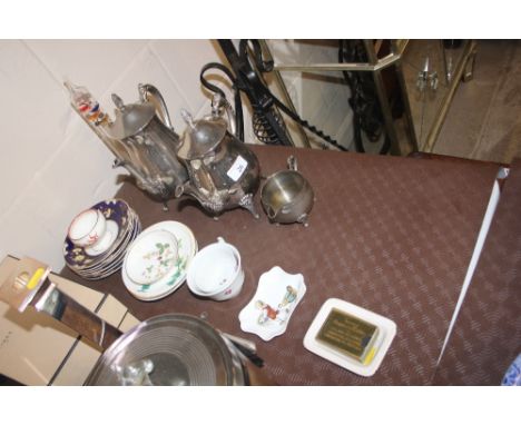 A silver plated three piece teaset; a glass thermometer; various saucers etc.