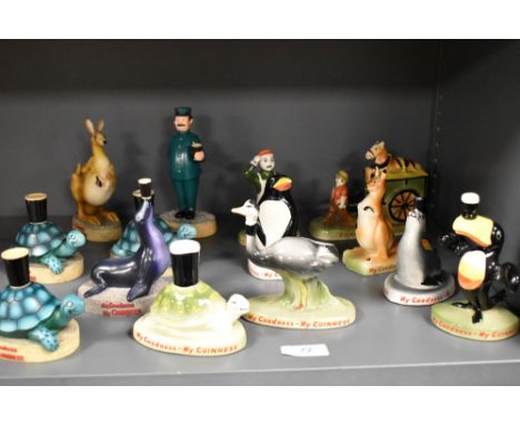 A collection of vintage and later Guinness collectables including Carltonware ceramic and later resin moulded