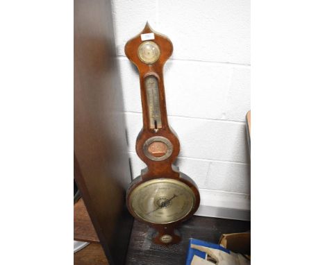 An early 20th century onion topped barometer, having inlaid detailing, AF.