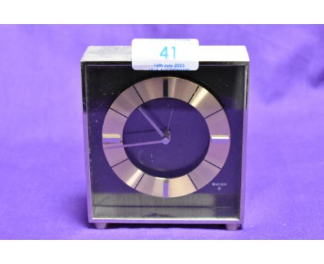 A 1970s Swiza 8 desk alarm clock, 10.5cm tall