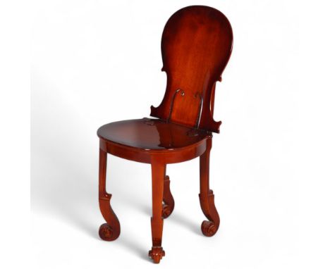 A cello chair in the manner of Fernandez Arman, constructed in such a way as to resemble cello parts with headstock feet and 