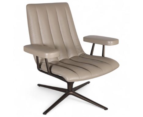 WALTER KNOLL, GERMANY, a Healey leather swivel lounge chair on mat bronze base, designed by Pearson Lloyd, leather impressed 
