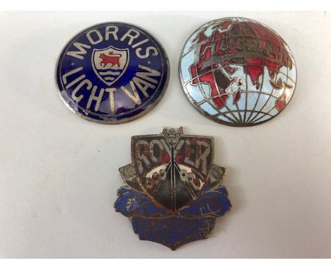 Vintage Enamel car badges, early Rover grill badge ,Triumph world badge and a Morris Light Van badge 