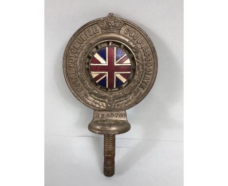 RAC club badge on screw mount, enamel union jack to  front center along with serial number ,reverse with card insert , stampe