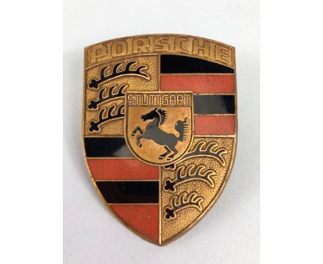 Porsche Motor cars,  Vintage Porsche bonnet badge brass with enamel approximately 50 x 70 mm marked R901 to reverse