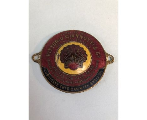 Enamel car dealership plaque, red and yellow enamel depicting a shell in the middle, Supplied By Vittorio Giannotti & Co, Age
