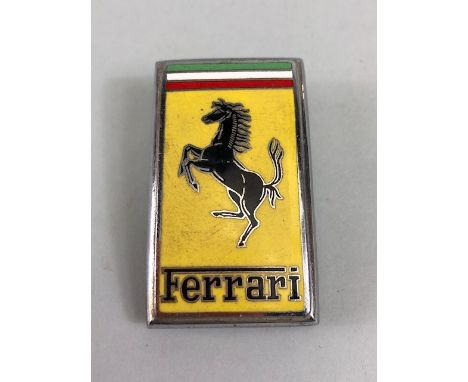 Ferrari sports cars,  1950s-70s bonnet badge enamel on chrome marked to reverse OMEA Milano approximately 35 x 60mm 