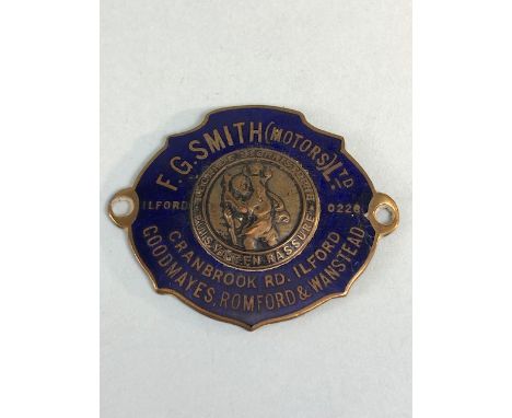 Vintage car dealer ship St Christopher enamel badge for F G Smith (Motors) Ltd Cranbrook Road Ilford approximately 5 cm acros