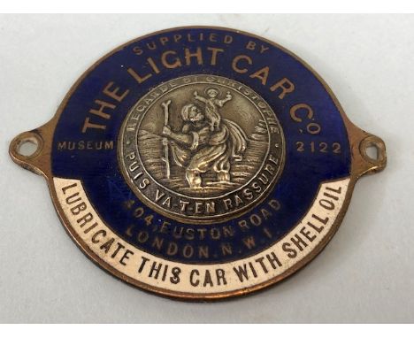 Vintage car dealership  St Christopher enamel badge for The Light Car Co 404 Euston Road London approximately 5 cm across mar
