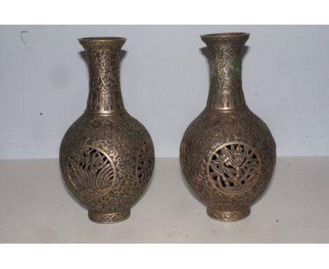 Pair of oriental bronze vases with pierced decoration Height 25 cm 