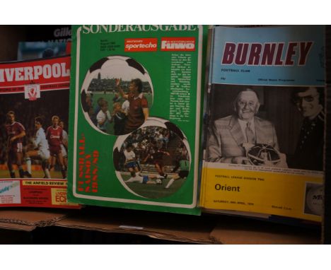 Box of vintage football programs 