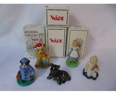 4 boxed Wade figures inc Alice in wonderland and one unboxed figure