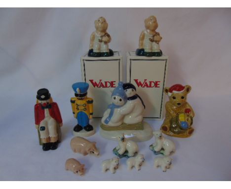 A collection of Wade figures to include 2 boxed examples and 7 whimsies