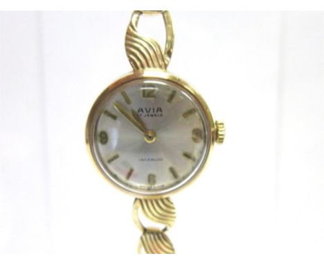 AVIA, A LADY'S 9 CARAT GOLD BRACELET WATCH Edinburgh 1963, the circular dial with gilt batons, Arabic quarters and hands, the