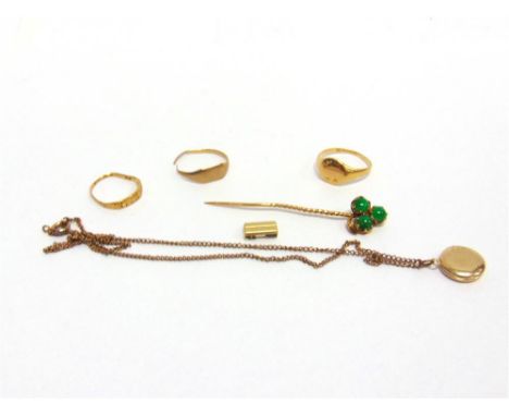 A JADE SET STICKPIN the three round cabochons to a trefoil arrangement; an 18 carat gold signet ring; two other similar rings