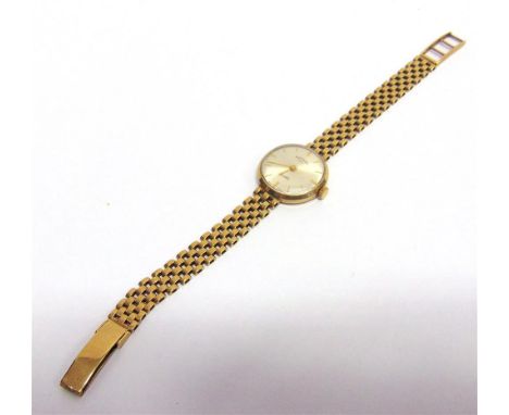 ROTARY, A LADY'S 9 CARAT GOLD WRISTWATCH on a 9 carat gold brick link bracelet, 11g gross, excluding the movement