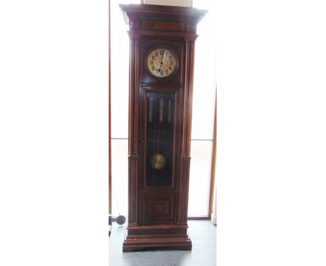 A LARGE CARVED WALNUT CASED LONGCASE CLOCK with triple weight driven 8-day Westminster chiming movement, the silvered dial wi