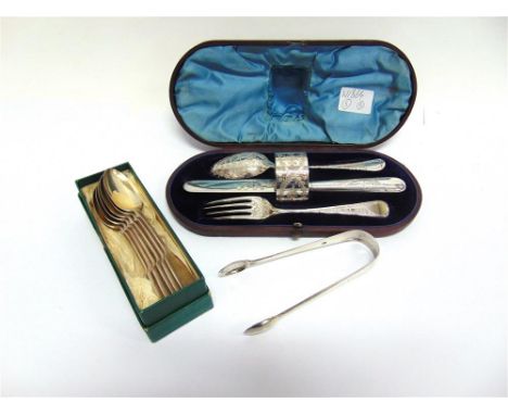 A VICTORIAN SILVER PLATED CHRISTENING SET  comprising knife, fork, spoon and napkin ring, with fern decoration, circa 1880, i