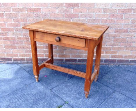 A PITCH PINE SIDE TABLE fitted with single drawer, 91cm wide 53.5cm deep 51cm high