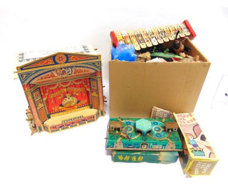 ASSORTED COLLECTABLES comprising tinplate toys; a Pelham Puppet; a modern Pollock's toy theatre; enamel badges; and other ite