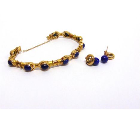 AN EGYPTIAN LAPIS LAZULI BRACELET and similar earrings, with control marks, the cabochon with baton links between to a hidden