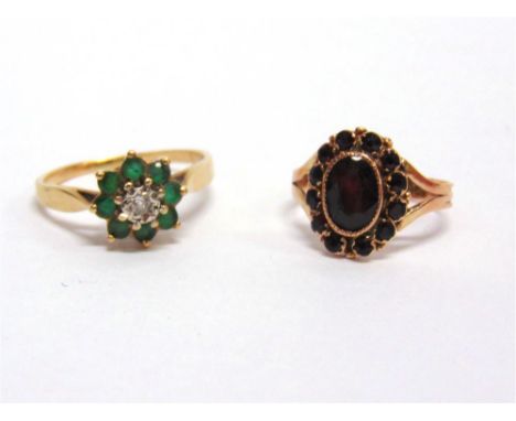 AN EMERALD AND DIAMOND 9 CARAT GOLD CLUSTER RING the brilliant cut illusion set, finger size R; with a 9 carat rose gold garn