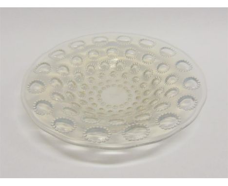 A LALIQUE 'ASTERS NO.2' PATTERN OPALESCENT SHALLOW GLASS BOWL decorated with graduated concentric bands of beaded circles, 25