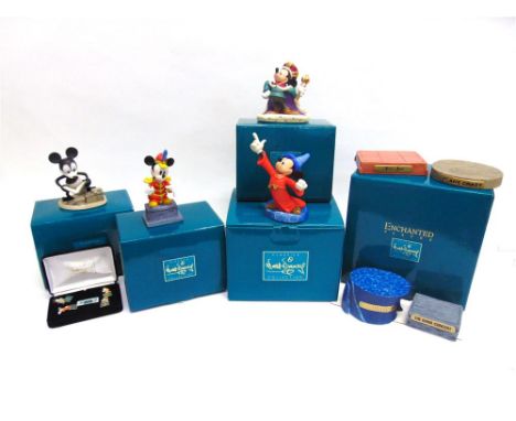 A SET OF FOUR 'WALT DISNEY CLASSICS' FIGURES: 'Plane Crazy', 'The Prince and the Pauper', 'Fantasia' and 'The Band Concert', 