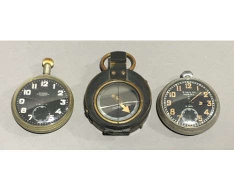 A military compass and two military watches