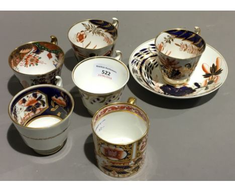 Two Spode porcelain London shape coffee cups and one saucer, circa 1815-1820, red painted SPODE/2214 and pattern number 2214;