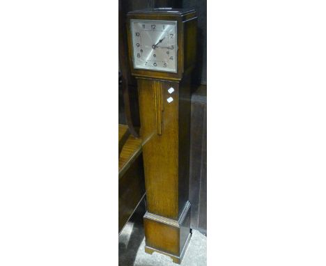 An oak cased Grandmother clock