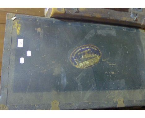 A vintage travelling trunk with Cunard White Star Line labels