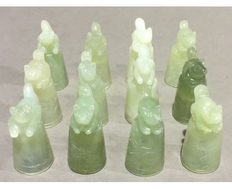 A set of twelve jade thimbles