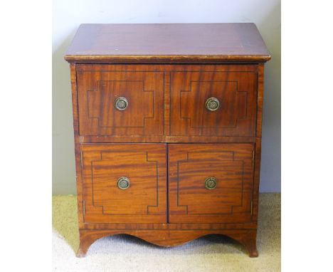 A mahogany commode