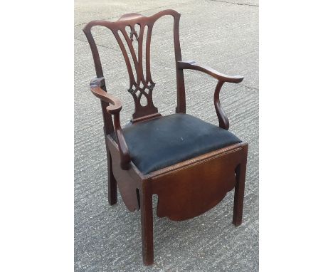 A George III mahogany commode chair