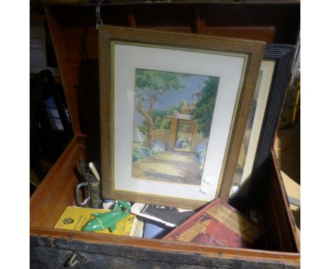 A trunk containing miscellaneous items, including paintings and prints, etc