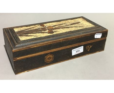 An Art Nouveau carved box