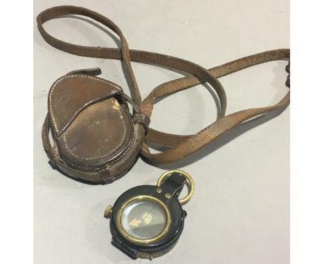 A WWI leather cased compass