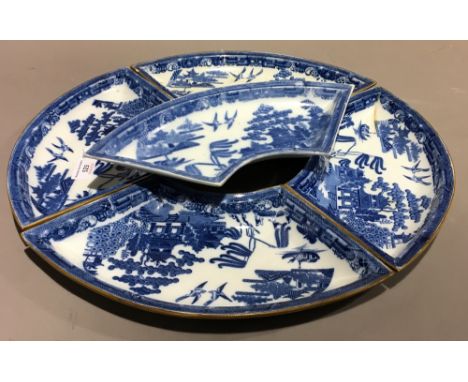 Four Spode blue printed pearlware segment dishes, circa 1790, impressed SPODE, and another similar 