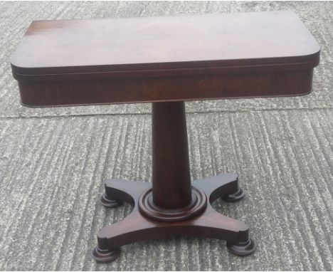 A Victorian rosewood card table