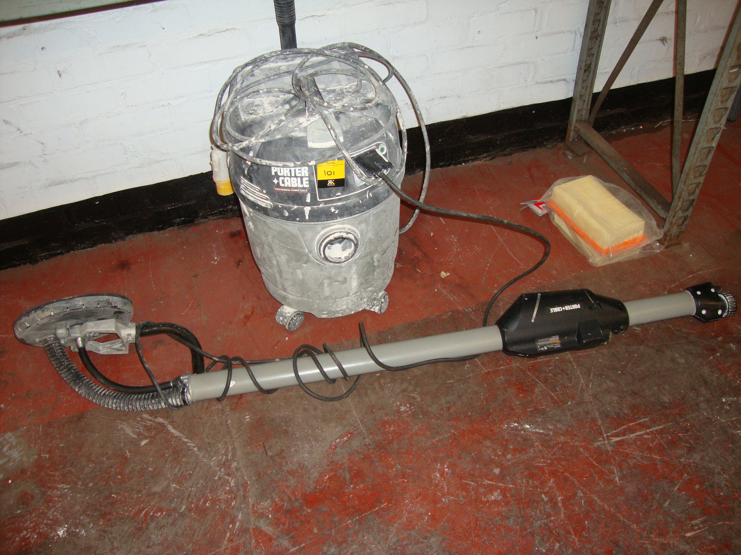 Porter Cable sanding system comprising 110v wet/dry vacuum and model