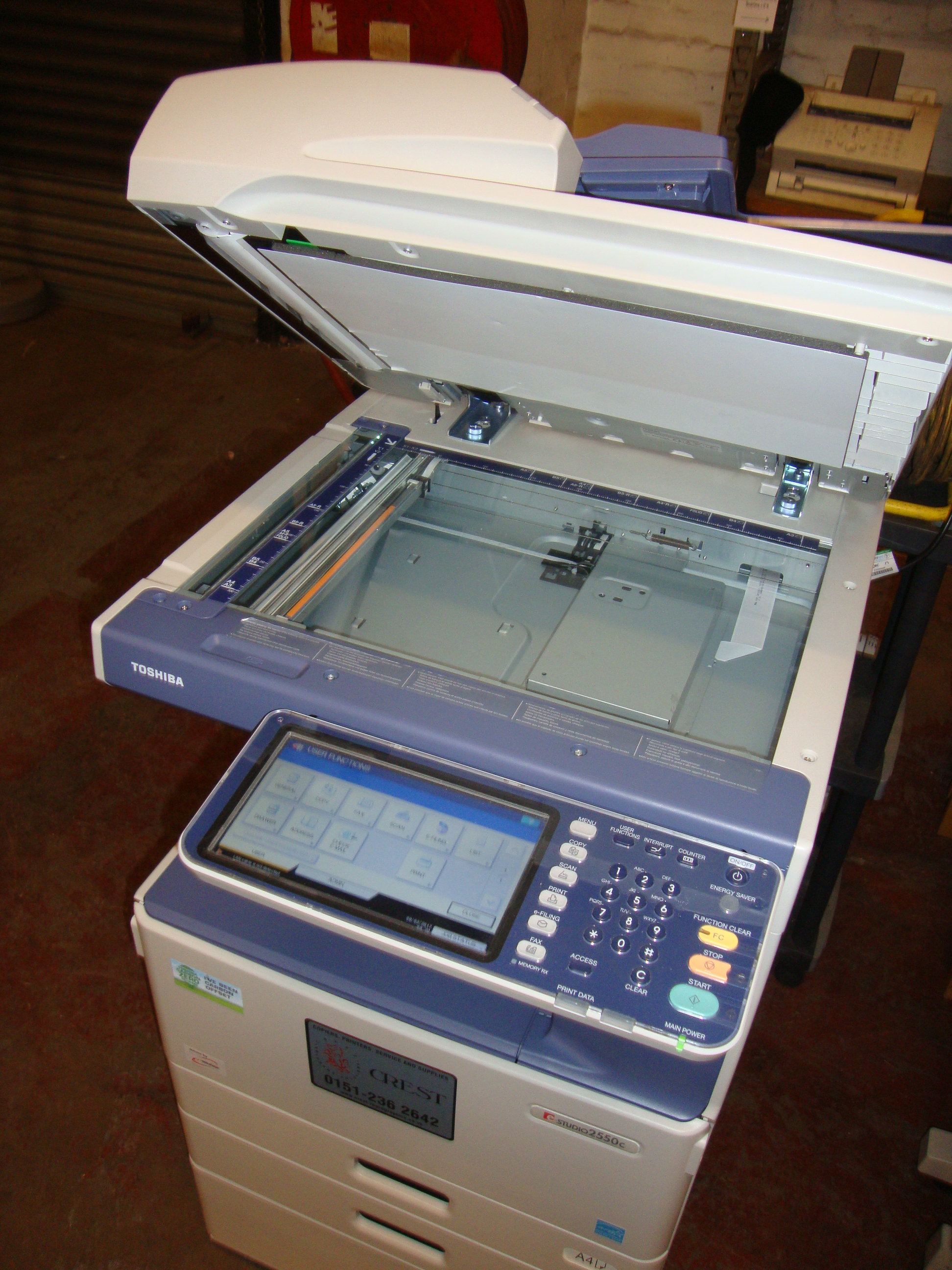 Toshiba eSTUDIO 2550C floor standing multifunction copier/printer with auto document feed, purch