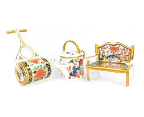 Three pieces of Royal Crown Derby Miniatures Imari porcelain, comprising Pardoe garden bench, 8cm high, Rich Japan watering c