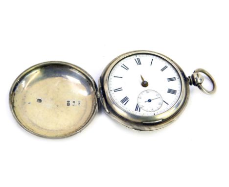 A silver full Hunter pocket watch, with white enamel Roman numeric dial, seconds dial and gold hands, the case with engine tu