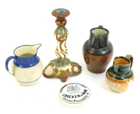 A group of Victorian and later pottery, to include stoneware jugs, a Fortnum and Mason Limited chicken and ham pot lid, relie