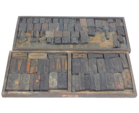 Vintage wooden letter press numbers, letters and punctuation, approx 100 individual printing blocks, in two original printer'