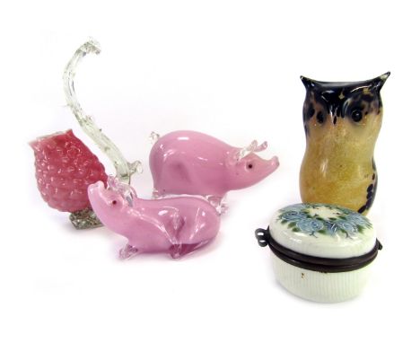 A group of decorative glassware, comprising an owl paperweight, 11cm high, two pigs, a porcelain trinket box, the lid decorat