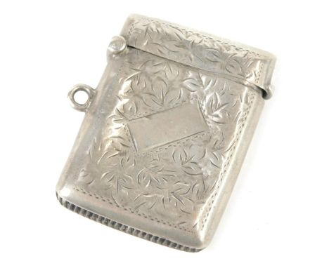 A George V silver Vesta case, of rectangular form with floral engraved decoration and a vacant shield, maker G R, Birmingham 