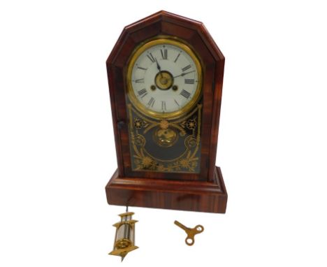 A late 19thC American rosewood cased mantel clock, circular brass dial with chapter ring bearing Roman numerals, eight day mo