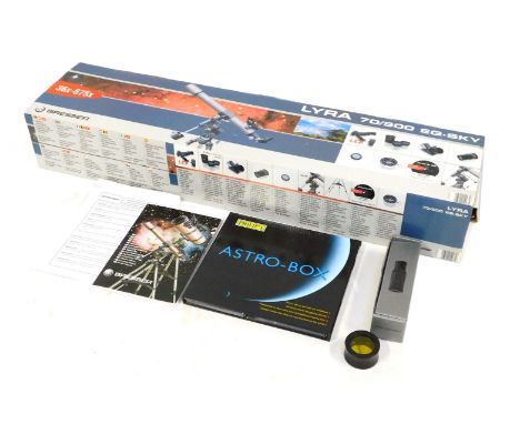 A Bresser Lyra telescope, 70-900 EQ-SKY, boxed, together with instruction booklet, a Stellarscope, binocular filter, and a Ph
